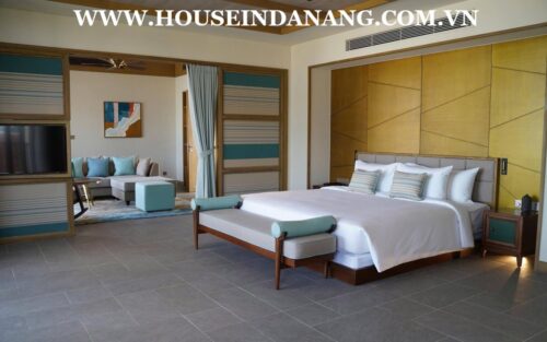 There are five modern bedrooms (Four bedrooms with luxury ensuite bathrooms) in Danang luxury villa rental. As the pictures, all bedrooms have the spectacular decoration with the modern color and full high end furniture. Besides, these bedroom seems to be quite airy with large windows towards the beach or the garden. Especially, big master bedrooms on the second floor even own theirs common rooms where have perfect sofas and you can easily admire the spectacular beauty of the beach from big windows as well. In addition, bedroom on upper floors also connect to front balconies where you can come out and getting the ocean view and the fresh air in the early morning. Moreover, there have been already full of Queen beds with soft mattresses, central air-conditioner systems, big wardrobes, and working table in bedrooms as well. For one more outstanding feature of the master bedroom is that it has a big modern bathroom which only follows in a big villa in Fusion resort and villas, high- end quality