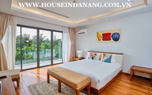 There are four nice bedrooms in the beachside villa rent Danang. As the below picture, bedrooms are quite airy with front windows. In addition, there has the warmly decoration with the wooden floor, wall paintings, gentle lights and the modern painting color in bedrooms. Besides, these bedrooms are quite airy with large windows viewing directly to the garden and the river. Or you can leisurely enjoy the peaceful beauty of the winding river meanders the villa area. So, it is great for you to get the fresh and admiring the peaceful and romantic life in the luxury Ocean villa compound. Moreover, there have been already full of Queen beds with soft mattresses, central air-conditioner systems, big wardrobes, and working table in bedrooms as well. Especially, the master bedroom is enough big to set up a small relaxing room inside and having an ensuite bathroom.